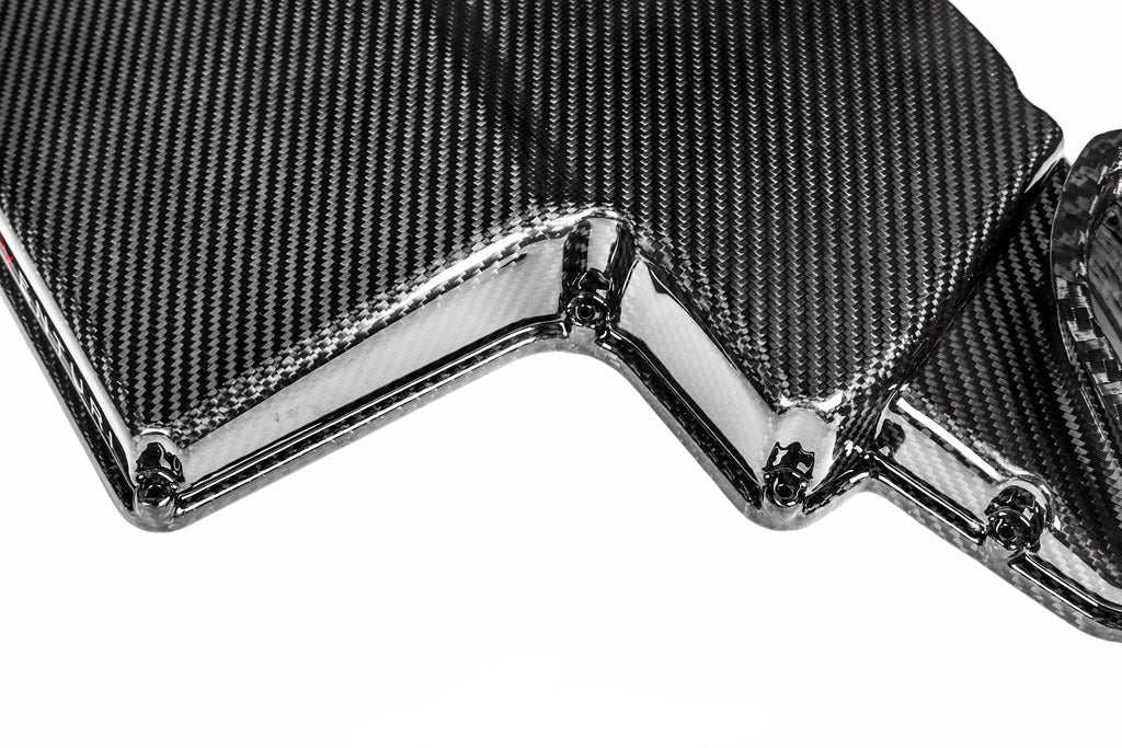 Eventuri E9X M3 gloss carbon fiber airbox lid with 2x2 twill weave and clear coat finish