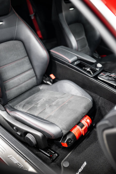 Mercedes W203W204 OEM fire extinguisher kit installed in car interior