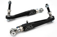 Pair of SPL Parts BMW G8X Front Lower Control Arms with adjustable camber and track width, made from lightweight aluminum and chromoly.
