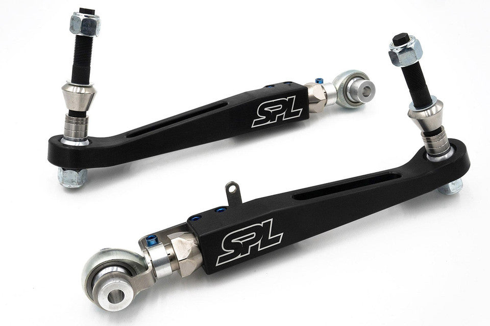 Pair of SPL Parts BMW G8X Front Lower Control Arms with adjustable camber and track width, made from lightweight aluminum and chromoly.